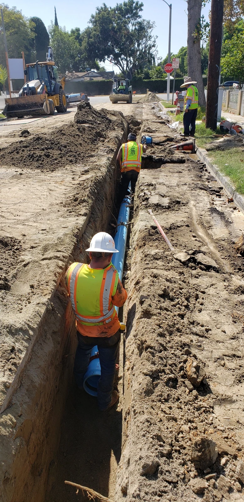 Pipeline installation along a utility trench