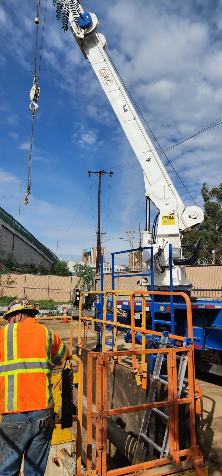 Crane supporting underground construction