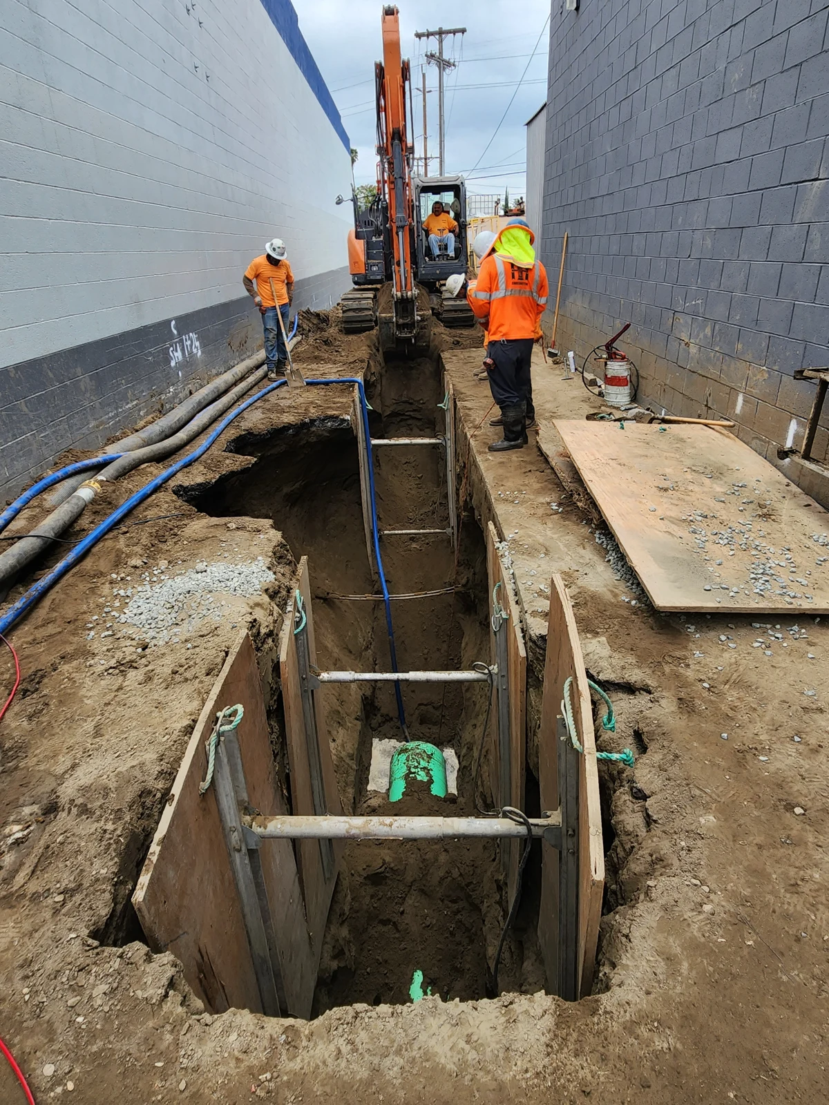 Underground utility work between buildings